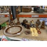 A COLLECTION OF TREEN ITEMS TO INCLUDE ELEPHANTS, CANDLESTICKS, NAPKIN RINGS, ANIMALS, ETC