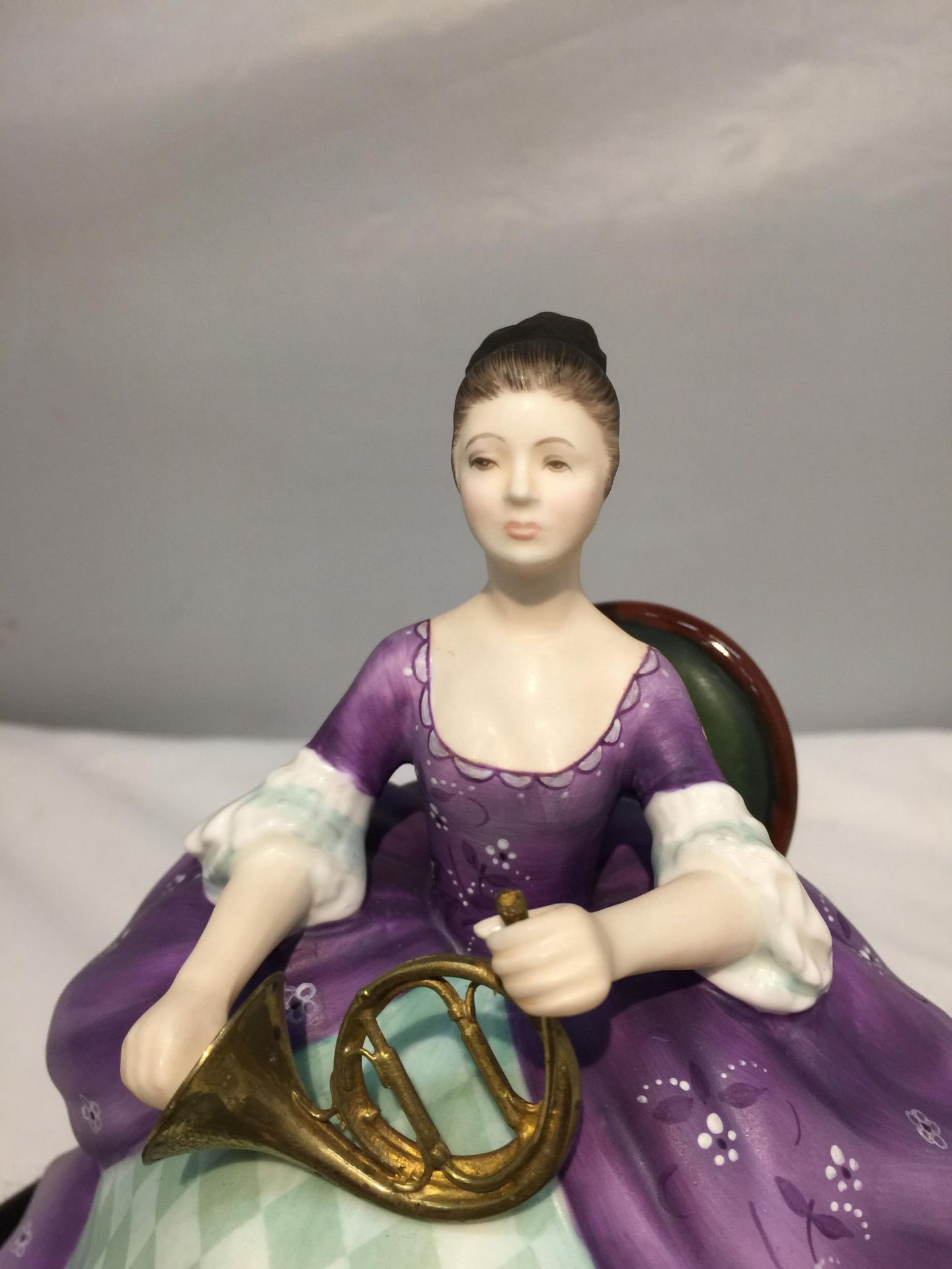 A ROYAL DOULTON FIGURINE, FRENCH HORN HN2795, MODELLED BY PEGGY DAVIES AS PART OF THE LADY MUSICIANS - Image 3 of 7