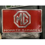 A CHROME AND RED MG MORRIS GARAGES SIGN 29CM X 17CM