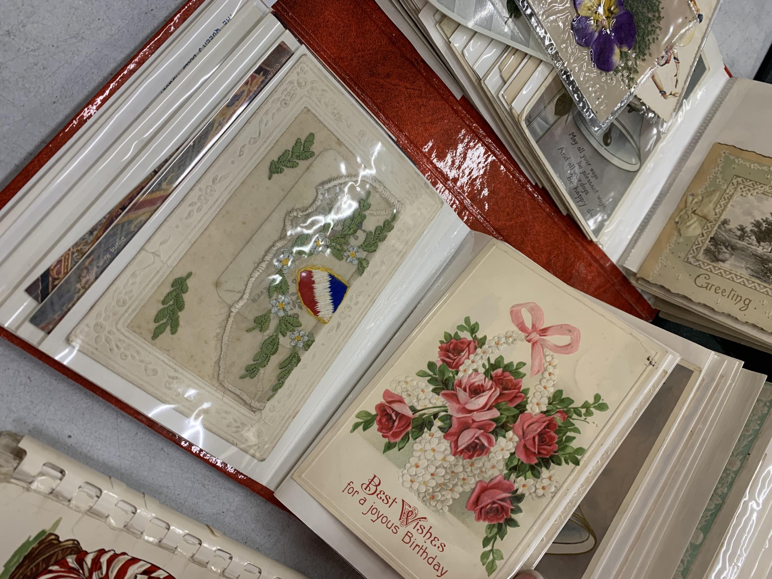 A PHOTO ALBUM CONTAINING VINTAGE POSTCARDS AND GREETINS CARDS, SOME HAND EMBROIDERED - Image 6 of 7