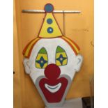A VERY LARGE HAND PAINTED CLOWN FACE 174CM X 202CM