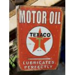 A TEXACO MOTOR OIL METAL SIGN