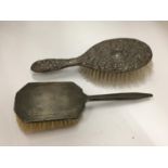 TWO HALLMARKED SILVER BACKED BRUSHES