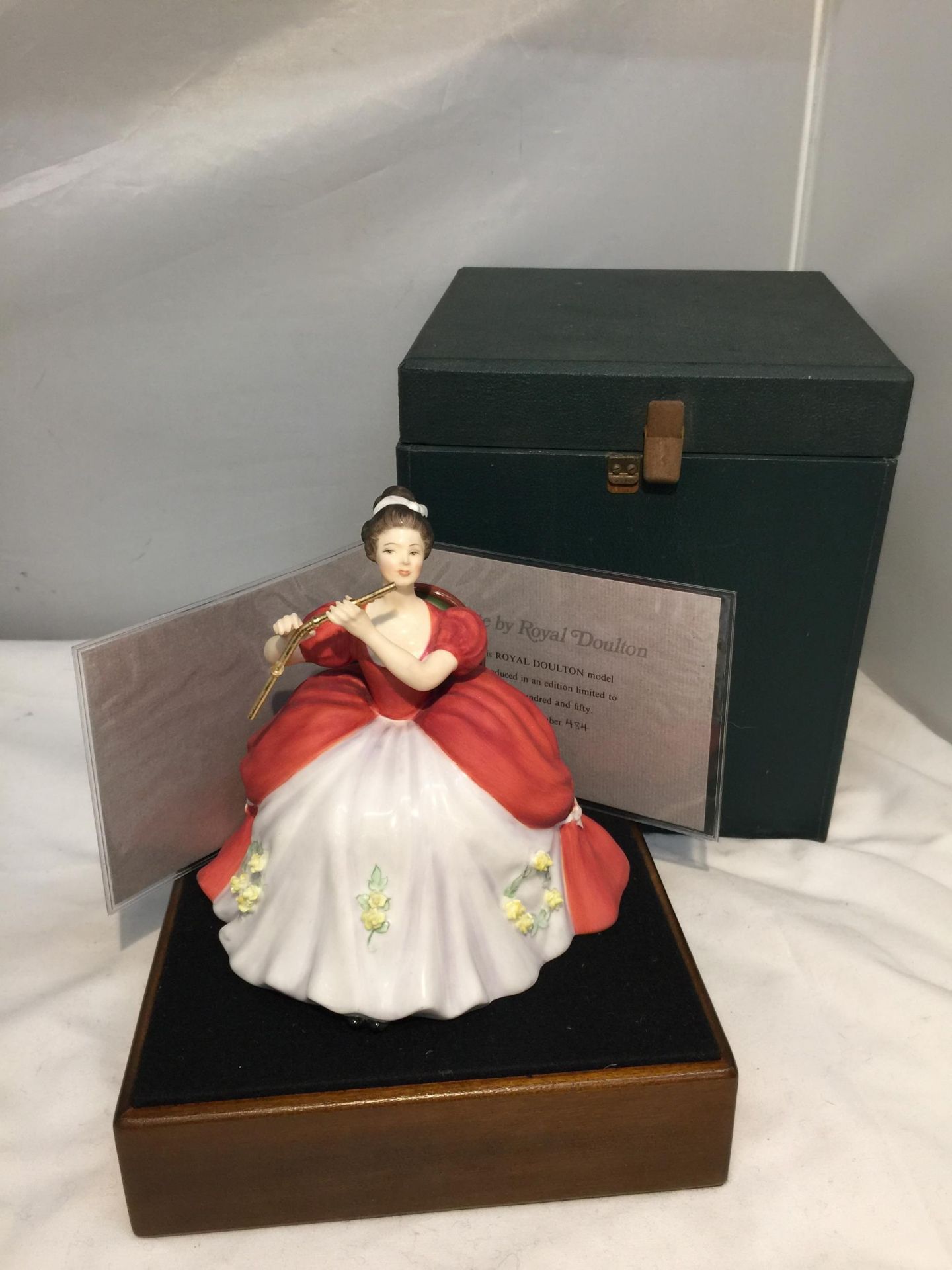 A ROYAL DOULTON FIGURINE, FLUTE HN2483, MODELLED BY PEGGY DAVIES AS PART OF THE LADY MUSICIANS