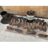 A LARGE ASSORTMENT OF VINTAGE CAST IRON COBBLER'S LASTS OF VARIOUS SIZES AND FURTHER COBBLER'S ITEMS