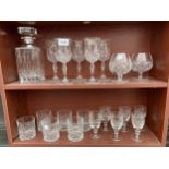 AN ASSORTMENT OF CUT GLASS TO INCLUDE A DECANTOR, WINE GLASSES AND BRANDY BALLOONS ETC