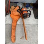 A PETROL CHAIN SAW WITH 20" BLADE