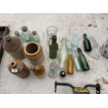 AN ASSORTMENT OF GLASS AND STONEWARE VESSELS