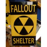 A METAL FALLOUT SHELTER SIGN