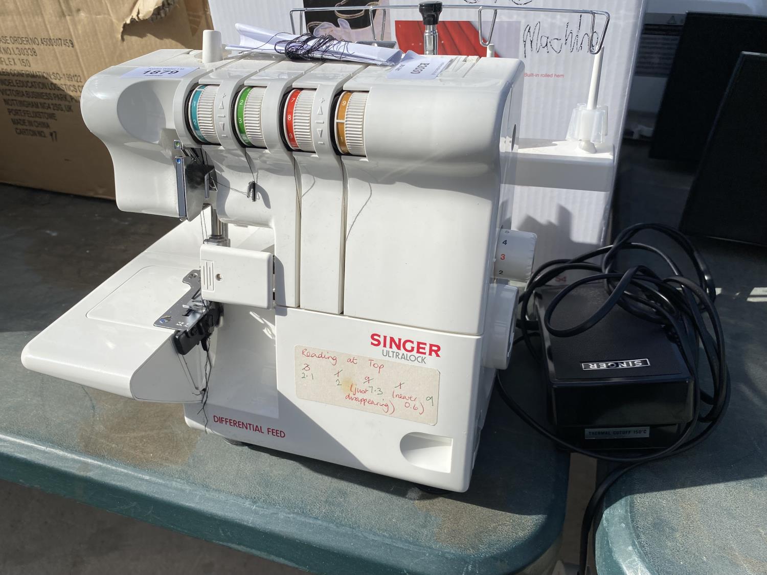 A RETRO SINGER ULTRALOCK SEWING MACHINE