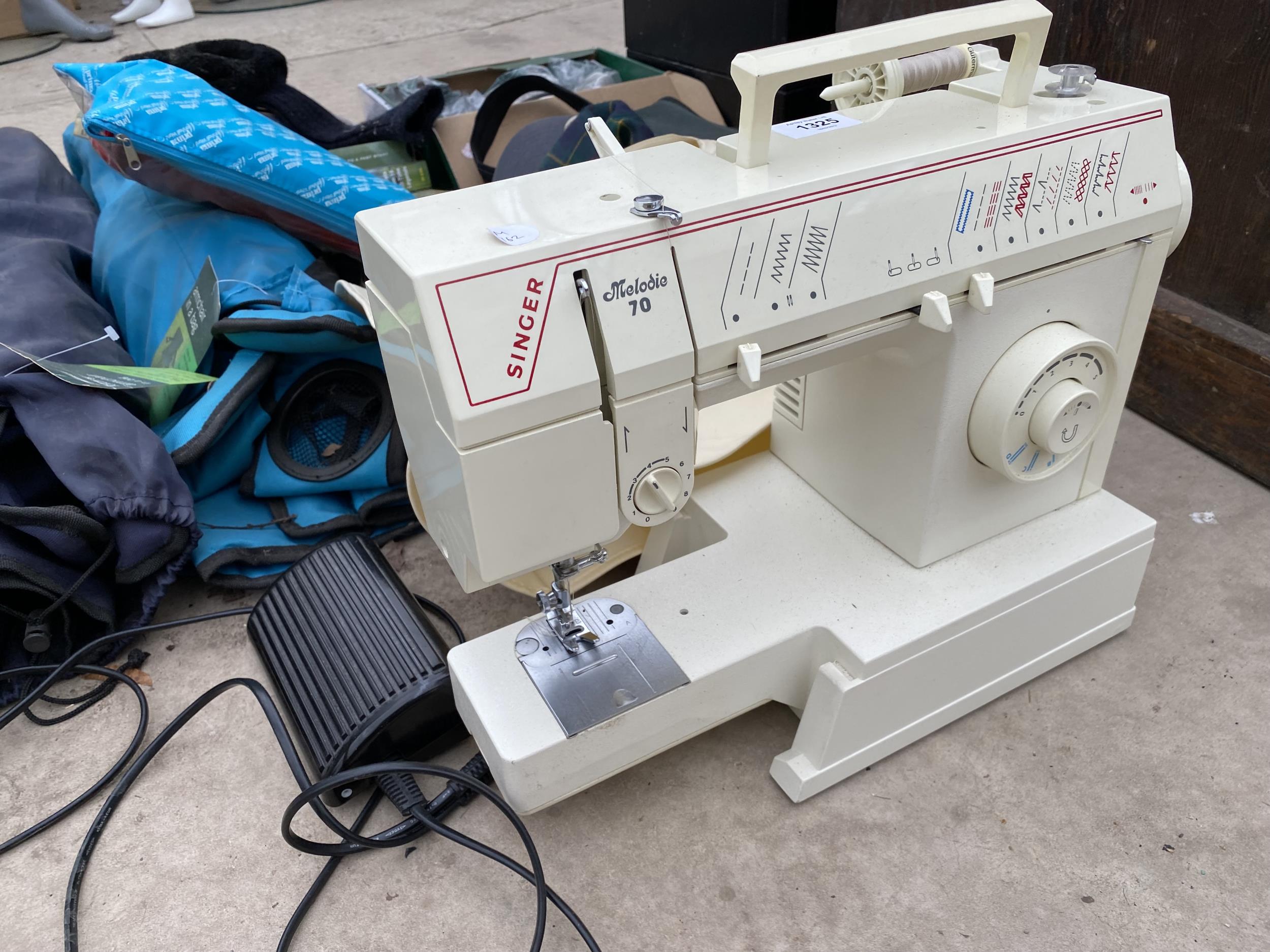 A RETRO SINGER SEWING MACHINE WITH FOOT PEDAL - Image 2 of 3