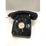 A VINTAGE BLACK TELEPHONE