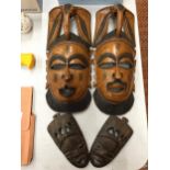 FOUR TRIBAL MASKS, TWO LARGE TWO SMALL