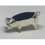 A MARKED SILVER MINIATURE PIG PIN CUSHION