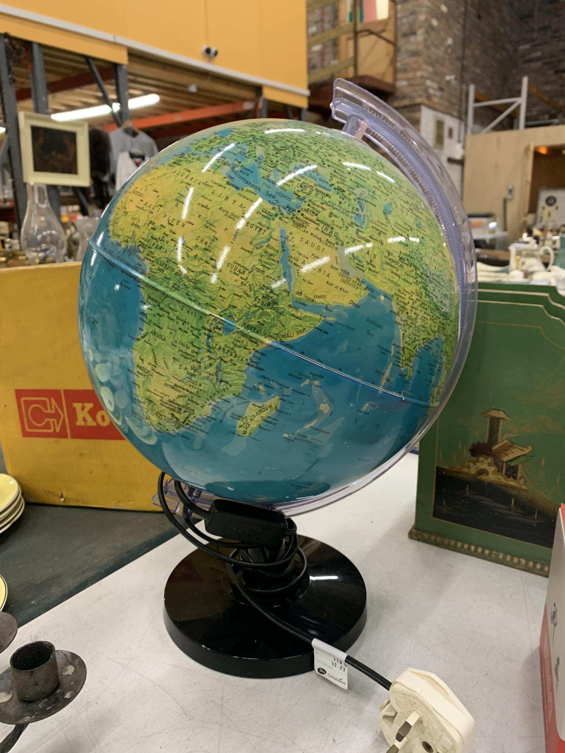 A LIGHT-UP GLOBE - Image 2 of 2