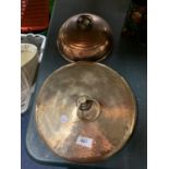 A ROUND BEATEN BRASS BED WARMER AND A COPPER BED WARMER WITH MAKERS NAME 'WAFAX'