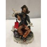 A CAPODIMONTE PORCELAIN FIGURE OF A SEATED MAN FEEDING DOVES A/F