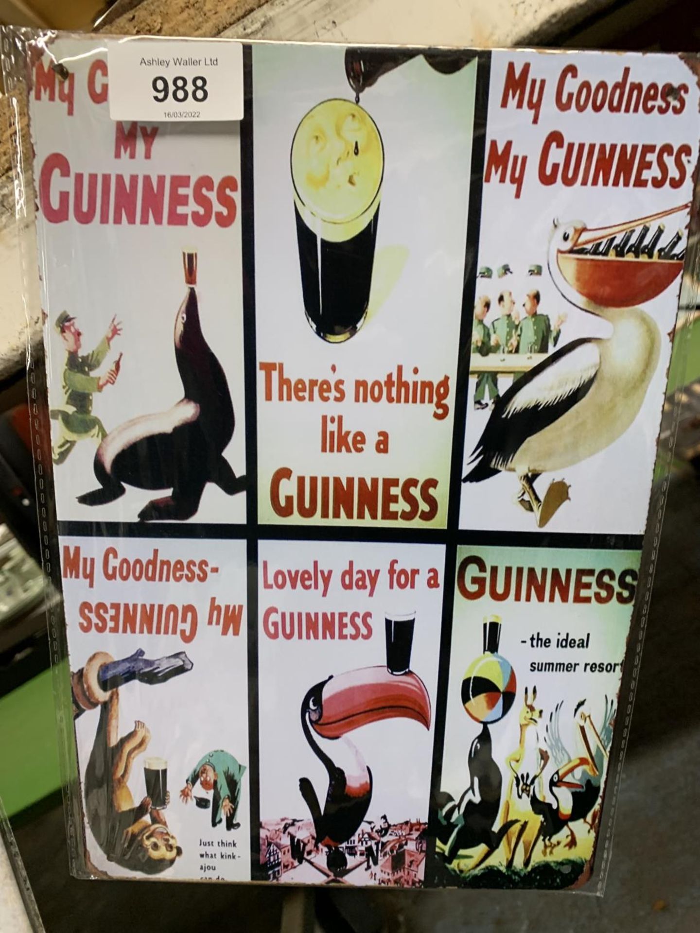 A GUINNESS ADVERTISING METAL SIGN