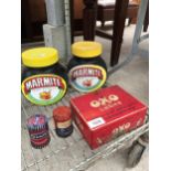 AN ASSORTMENT OF ITEMS TO INCLUDE A MARMITE MONEY BOX, AN OXO CUBES TIN ETC