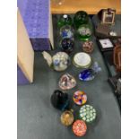 A LARGE COLLECTION OF COLOURED GLASS PAPERWEIGHTS