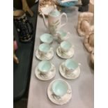 A QUANTITY OF ROYAL ALBERT 'FESTIVAL' TEAWARE TO INCLUDE, FIVE CUPS AND SAUCERS, COFFEE POT, CREAM