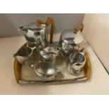 A SIX PIECE PICQUOT WARE TEA SET PLUS THE TRAY