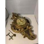 A GILDED CHIMING WALL CLOCK WITH ENAMEL FACE TO INCLUDE TWO KEYS (NEEDS RESTORING)