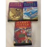 THREE HARRY POTTER FIRST EDITION HARDBACKS BY J.K. ROWLING. THE PHILOSPHER'S STONE PUBLISHED 1997 (