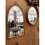 TWO DECORATIVE WALL MIRRORS TO INCLUDE ONE WITH A BRASS FRAME