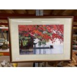 A LARGE FRAMED NEEDLEWORK PICTURE OF AN ORIENTAL SCENE SIZE 82 CM X 58 CM