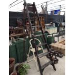 A VINTAGE FIVE RUNG WOODEN STEP LADDER AND A FURTHER TWO RUNG KITCHEN STEP