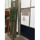 A VINTAGE WOODEN FRENCH WINDOW SHUTTER AND A VINTAGE WOODEN HUNGARIAN DOOR