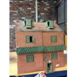A LARGE DOLLS HOUSE WITH FRONT OPENING