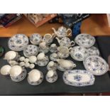 A LARGE QUANTITY OF DINNER WARE TO INCLUDE, VARIOUS SIZE PLATES, CUPS, SAUCERS, BOWLS, TEA AND