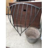 A VINTAGE CORNER HAYRACK AND A GALVANISED METAL BUCKET