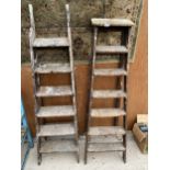 TWO VINTAGE WOODEN SIX RUNG STEP LADDERS