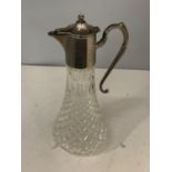 A GLASS CLARET JUG WITH A SILVER PLATED HANDLE AND TOP (ENGRAVED ASHTON ON MERSEY G C LAWSON CUP 3RD