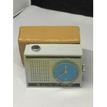 A VINTAGE MINIATURE SUMATIC ALARM CLOCK WITH CASE