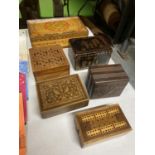 A COLLECTION OF DECORATIVE WOODEN BOXES INCLUDING CARVED AND INLAY EXAMPLES, ONE ORIENTAL STYLE