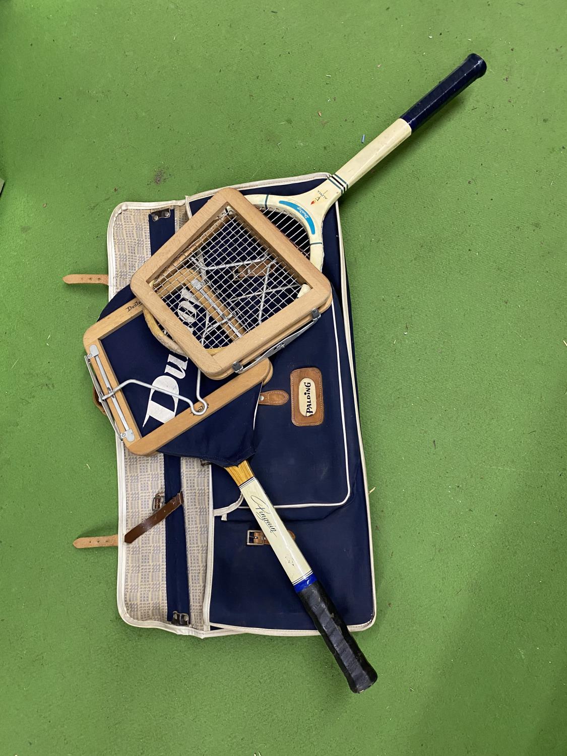 TWO VINTAGE DUNLOP WOODEN TENNIS RACKETS WITH ORIGINAL PRESSES IN A SPALDING BAG