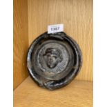 A VINTAGE CAST IRON DOOR KNOCKER