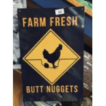 A CHICKEN NUGGETS METAL SIGN