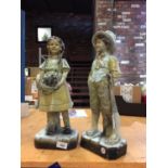 TWO CHALK WARE FIGURES OF A BOY AND A GIRL A/F