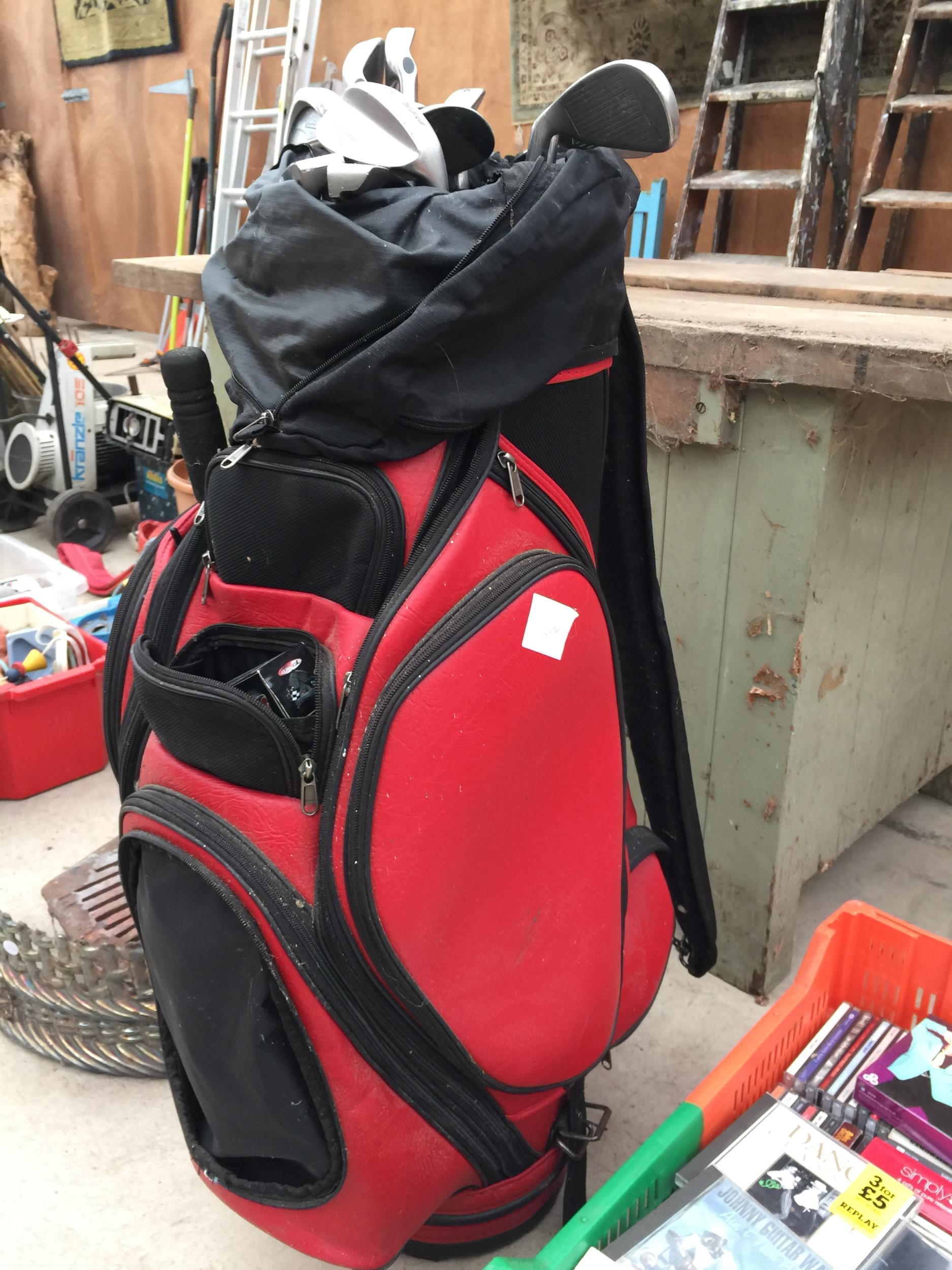 A GOLF BAG CONTAINING AN ASSORTMENT OF GOLF CLUBS TO INCLUDE IRONS AND PUTTERS ETC - Image 2 of 2