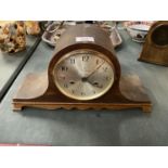 A NAPOLEONS HAT MAHOGANY CASED MANTLE CLOCK- WORKING AT LOTTING UP