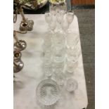 A QUANTITY OF CUT GLASS ITEMS TO INCLUDE WINE, SHERRY, WHISKEY, ETC