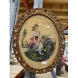 AN OVAL GILT FRAMED TAPESTRY OF A LADY