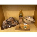 AN ASSORTMENT OF TREEN ITEMS TO INCLUDE A CANDLE HOLDER, A BAROMETER AND A COCONUT ETC