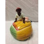 A 19TH CENTURY MAJOLICA 'BOY SITTING ON A MELON' TOBACCO JAR