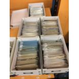 A VERY LARGE COLLECTION OF APPROXIMATELY 2500 SLEEVED VINTAGE POSTCARDS IN FOUR BOXES DEPICTING